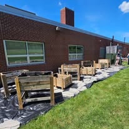 Newly built raised garden beds outside our community building